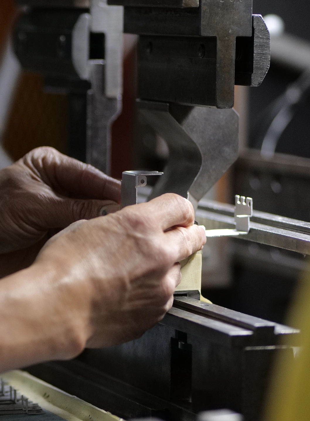 man forming the metal product