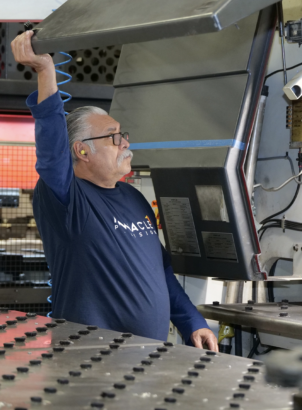 Man holding machine fabrication project