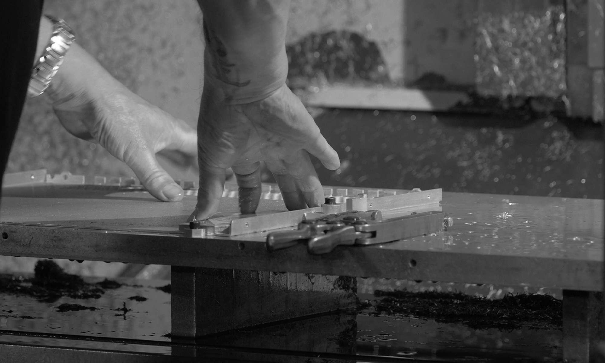 man doing piece of work on a table