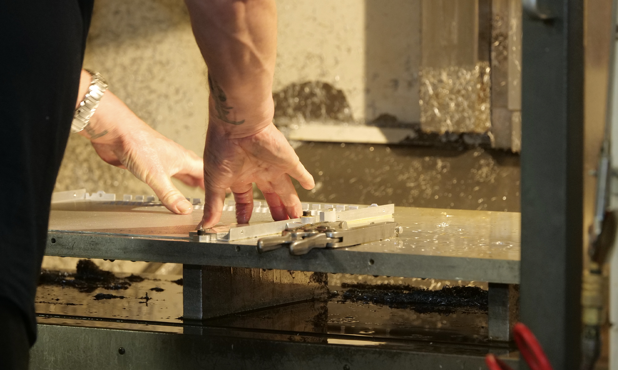 man doing piece of work on a table