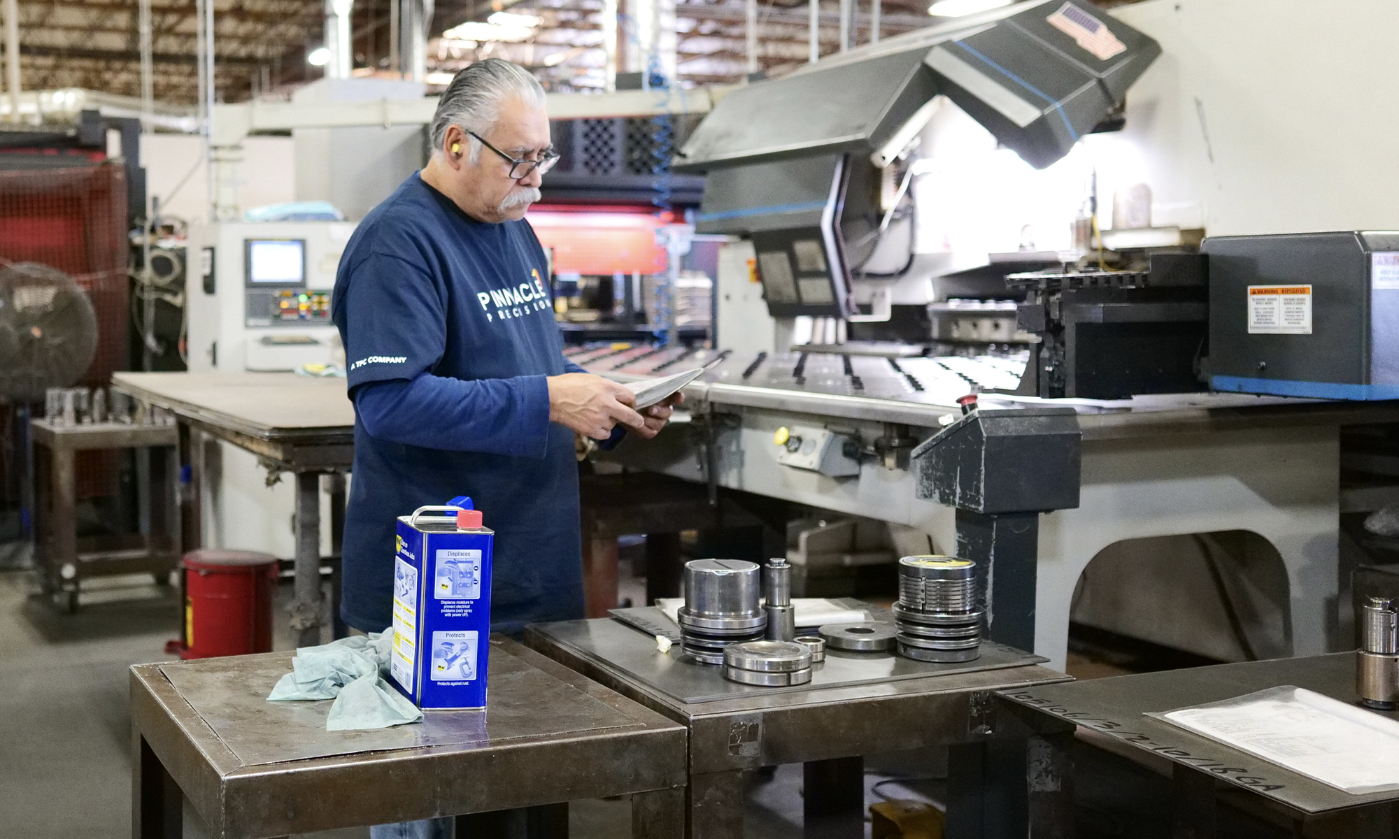 Man working on sheet metal fabrication project