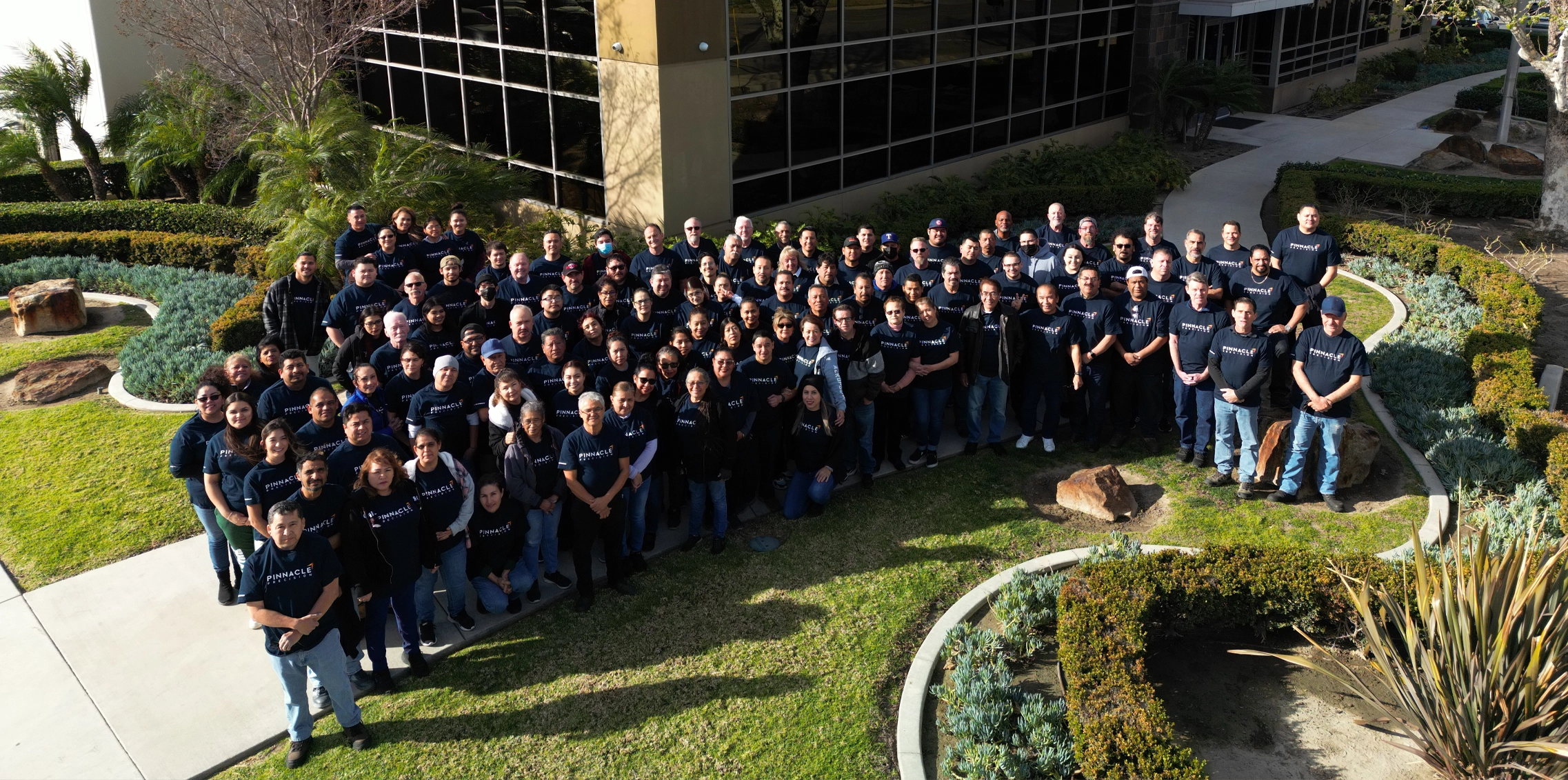 Pinnacle Precision team photo outside of office